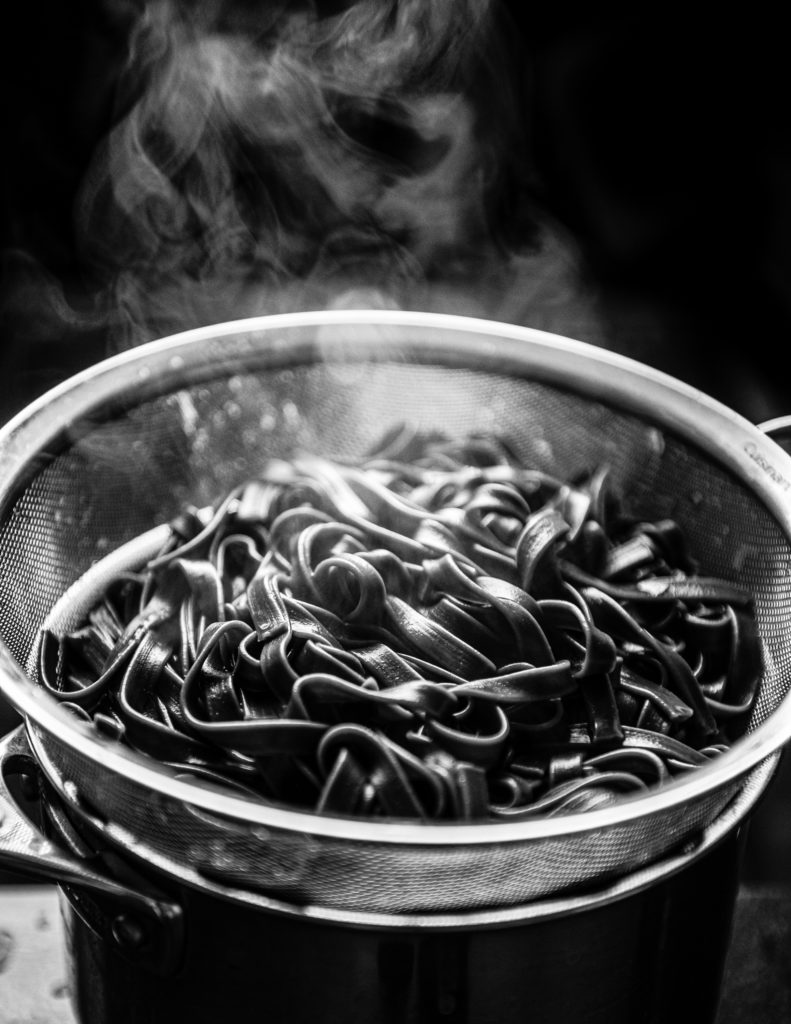 squid ink pasta aglio e olio - Two Red Bowls