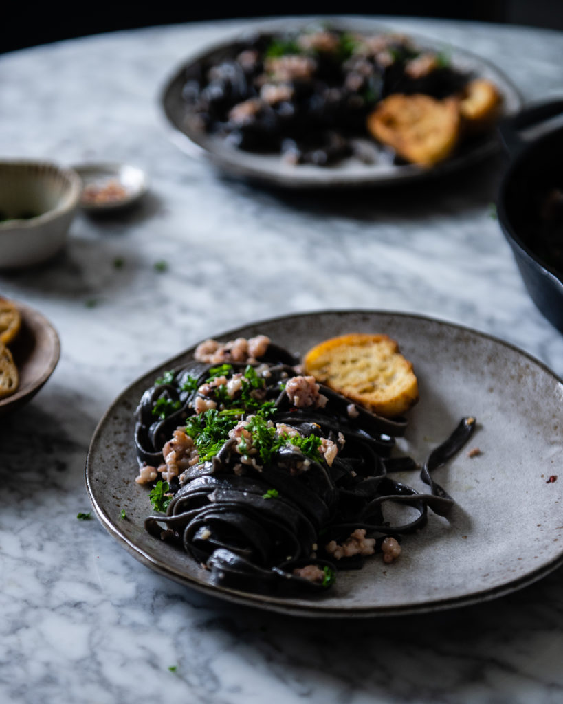 squid ink pasta aglio e olio - Two Red Bowls